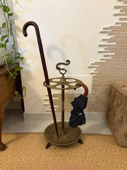 Portaombrelli antico in ghisa con design ornamentale vintage per ingresso elegante