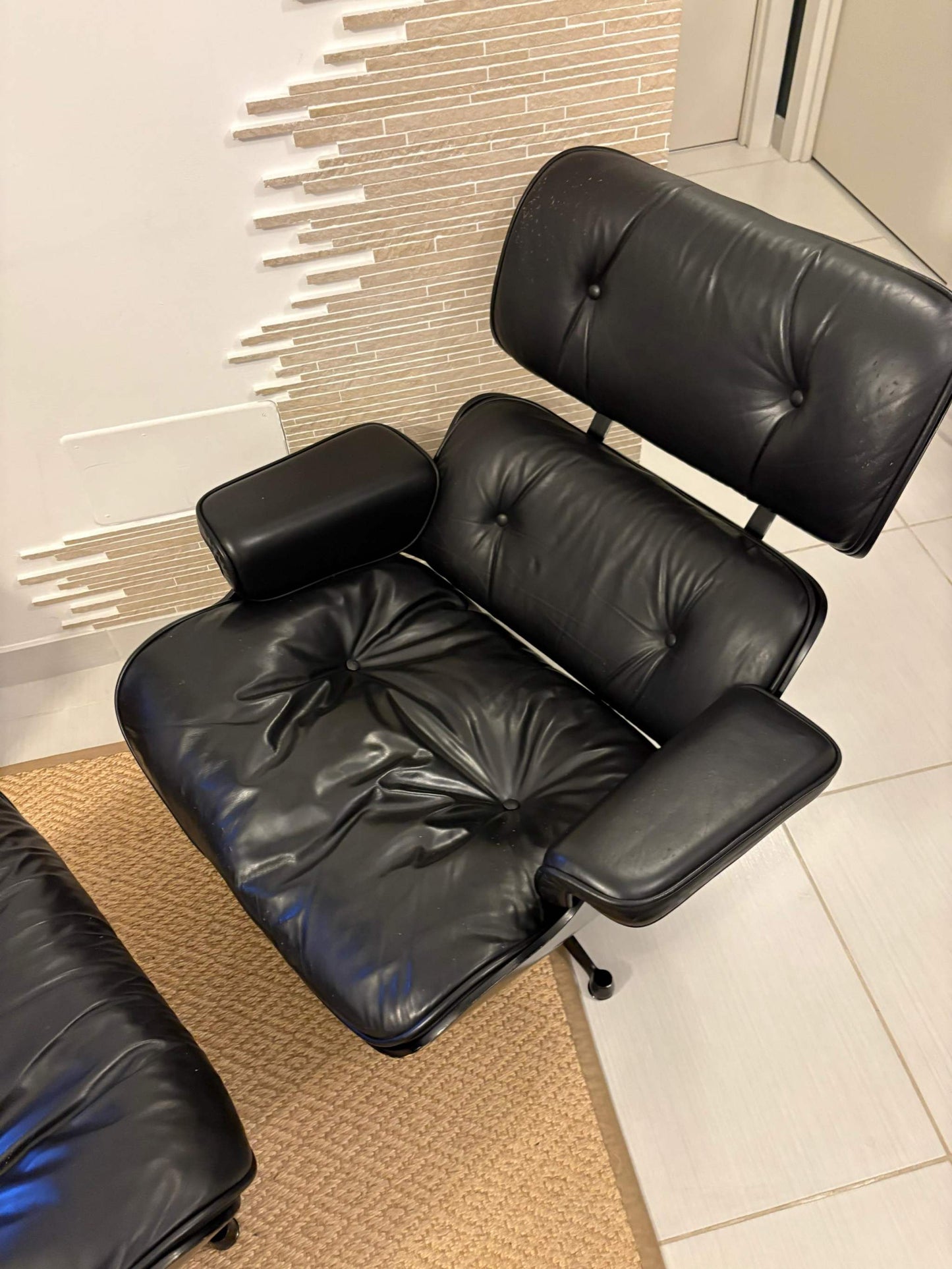A timeless icon of modern design, this Eames Lounge Chair produced by ICF