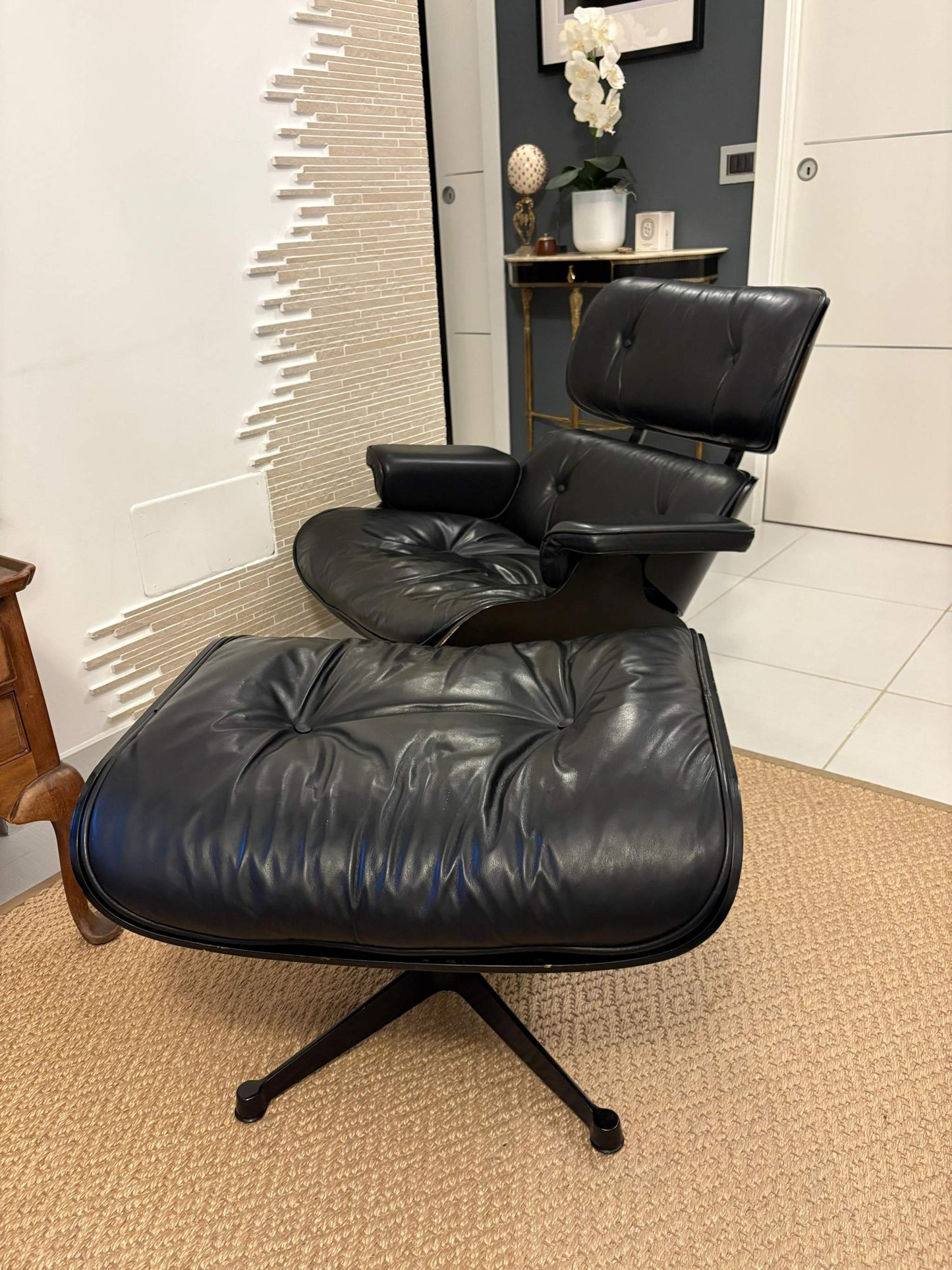 A timeless icon of modern design, this Eames Lounge Chair produced by ICF