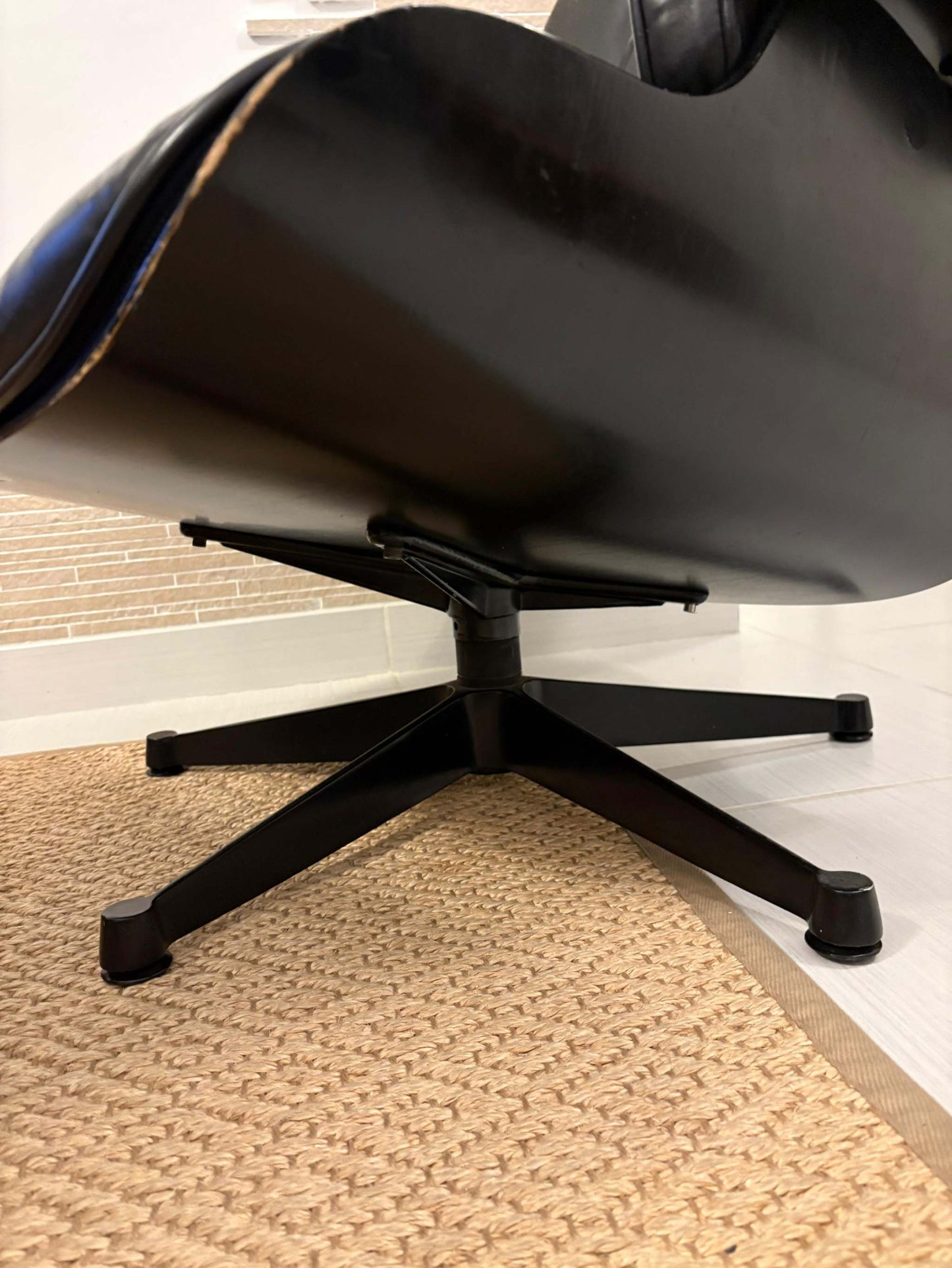 A timeless icon of modern design, this Eames Lounge Chair produced by ICF