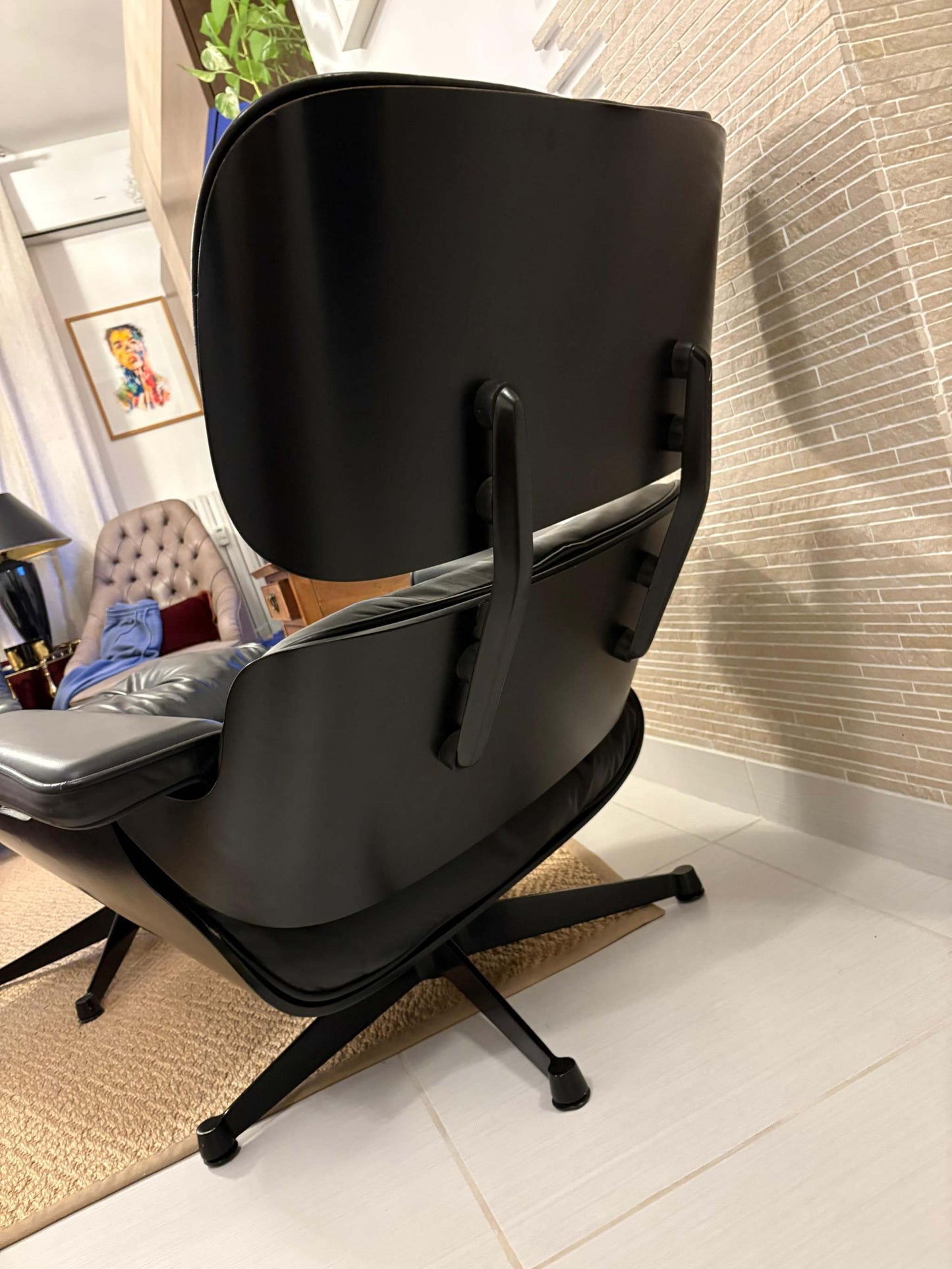 A timeless icon of modern design, this Eames Lounge Chair produced by ICF