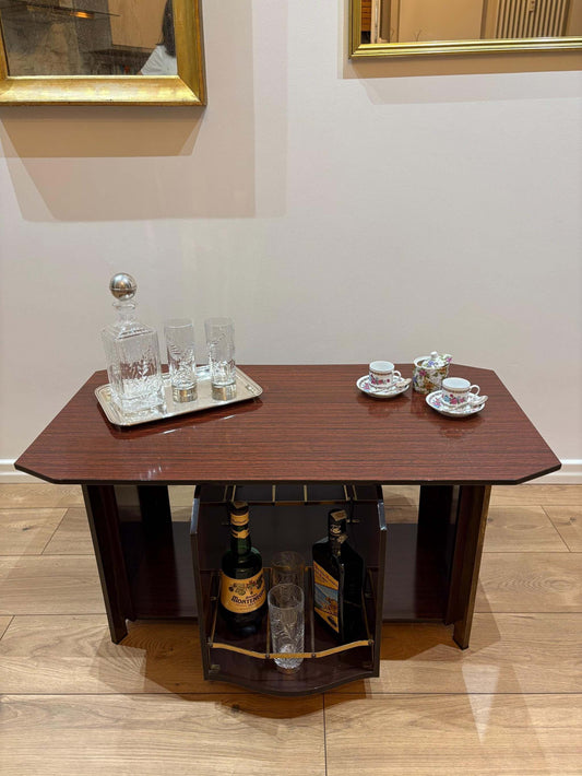 tavolo bar vintage italiano con ripiani in vetro e portasci liquori rotante stile Hollywood Regency
