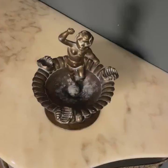 Mid century Italian ashtray on wooden side table with cigar
