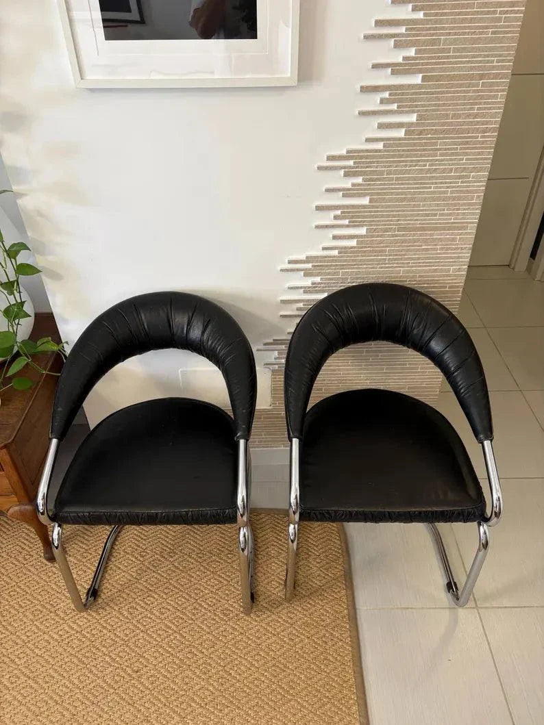 Sedie vintage in pelle Giotto Stoppino con struttura tubolare in acciaio cromato stile mid-century moderno ispirate al design Wassily.